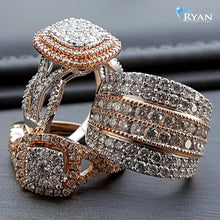 Load image into Gallery viewer, RING GR 10K 1.00CTW IMPERIAL SQUARE CENTER WITH CUSHION SHAPE HALO CRISS CROSS SHOULDER BRIDAL SET
