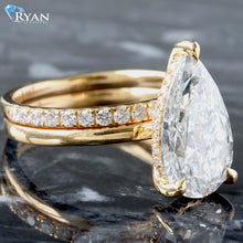 Load image into Gallery viewer, 3.81ctw Pear Solitaire with Hidden Halo Three Prongs And High Polished Shoulders and Pave Diamond Band Bridal Set
