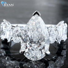 Load image into Gallery viewer, 8.17ctw Pear Cut Center with Alternating  Pear Cut Shoulders 2/3 Eternity Ring

