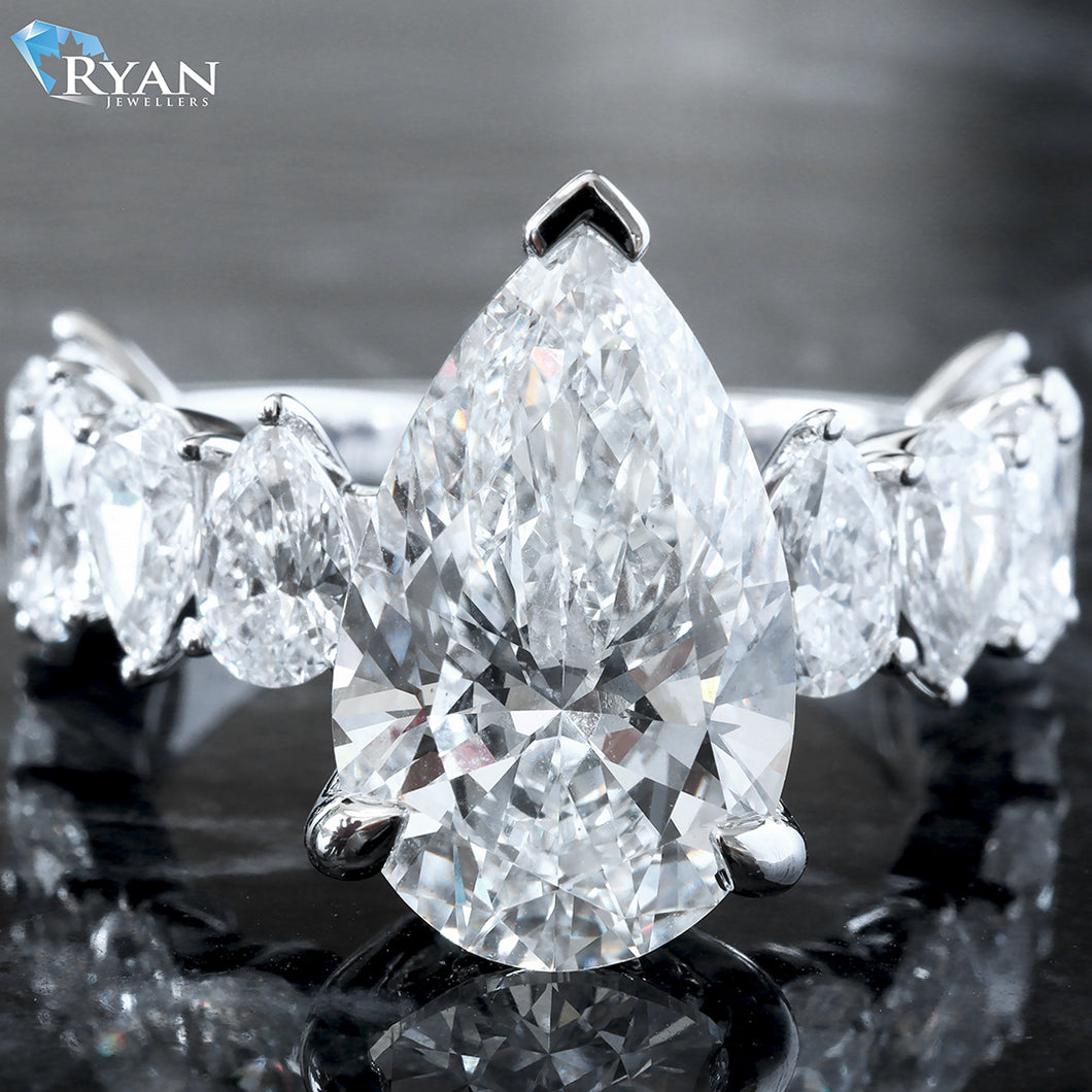 8.17ctw Pear Cut Center with Alternating  Pear Cut Shoulders 2/3 Eternity Ring