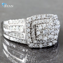 Load image into Gallery viewer, RING GW 10K 1.00CTW IMPERIAL CUSHION CLUSTER WITH DOUBLE HALO FOUR ROW CHANNEL AND PRONG SET SHOULDERS
