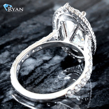 Load image into Gallery viewer, 5.97ctw Old European Moval Cut Solitaire with Halo and Pave Diamond Shoulders
