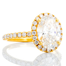 Load image into Gallery viewer, 2.60ctw Lab Oval Cut Center with Natural Halo Diamonds and Pave Shoulders
