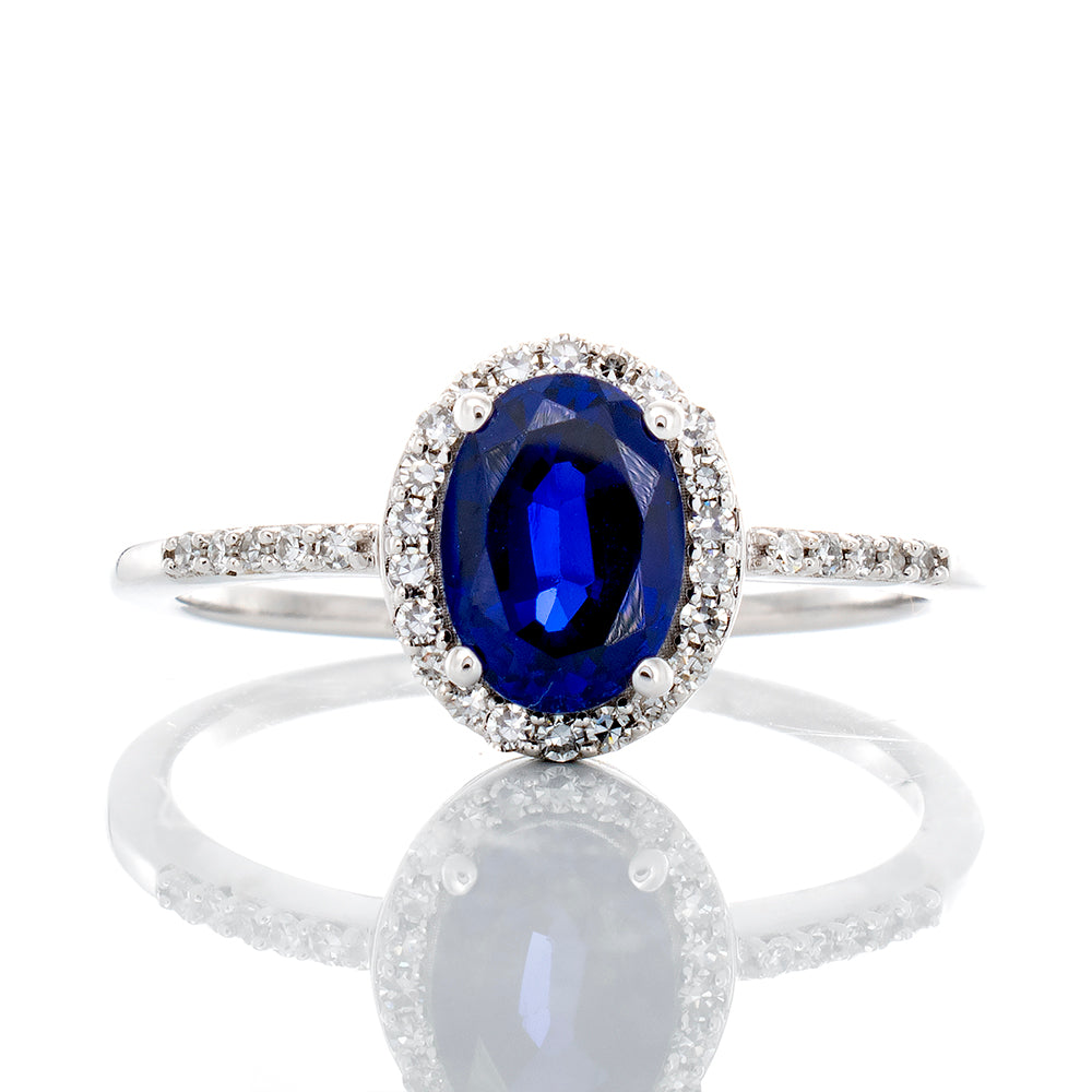 0.12ctw Oval Cut Sapphire with Halo Ring