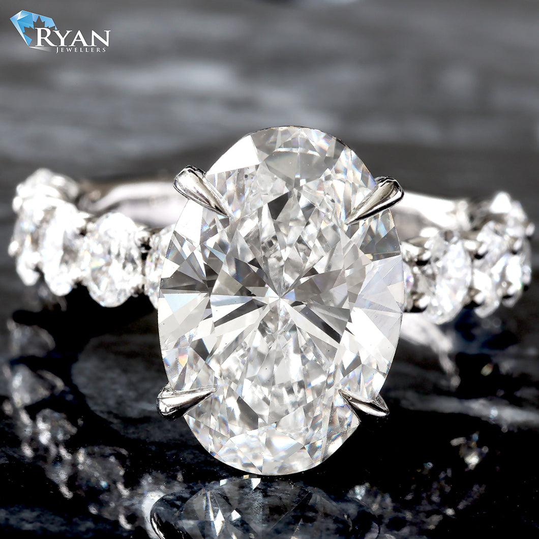 7.06ctw Oval Solitaire with Oval Diamond Shoulders & Basket