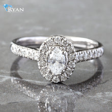 Load image into Gallery viewer, 0.50CTW Oval Halo with Diamond Pave Shoulders Ring
