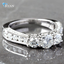 Load image into Gallery viewer, RING GW 10K 1.60CTW THREE STONE RING HEART BASKETS WITH CHANNEL SET CENTER SHOULDERS PAVE SET N&amp;S SHOULDERS UPSWEPT
