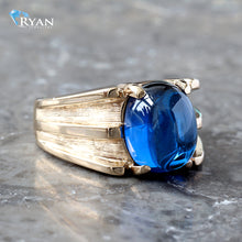 Load image into Gallery viewer, Wide Tapered Ridge W/ Syn Blue Oval Stone Ring
