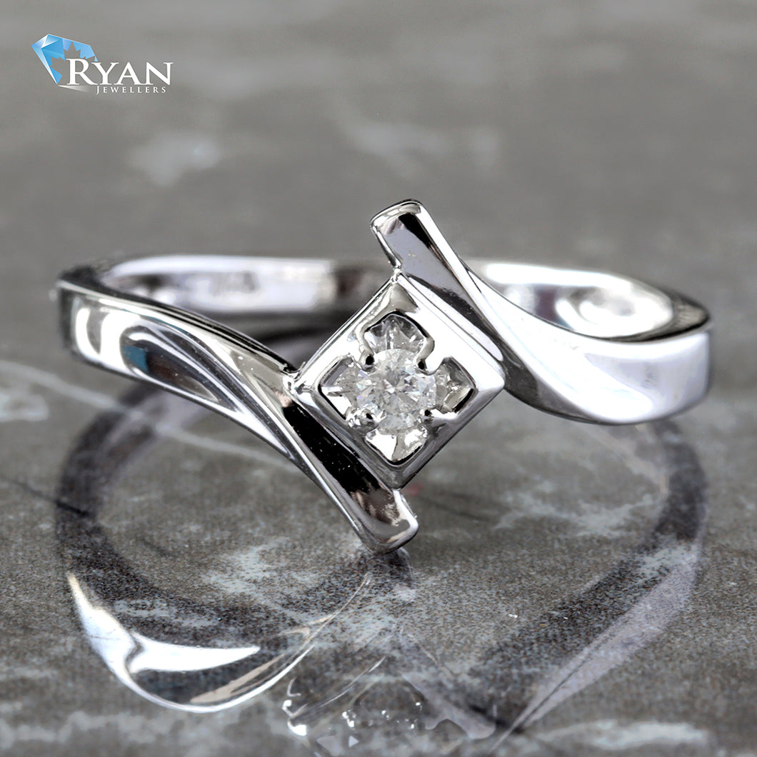 RING GW 10K 0.03CTW ROUND DIAMOND SET IN SQUARE CENTER SWOOPED SHOULDERS