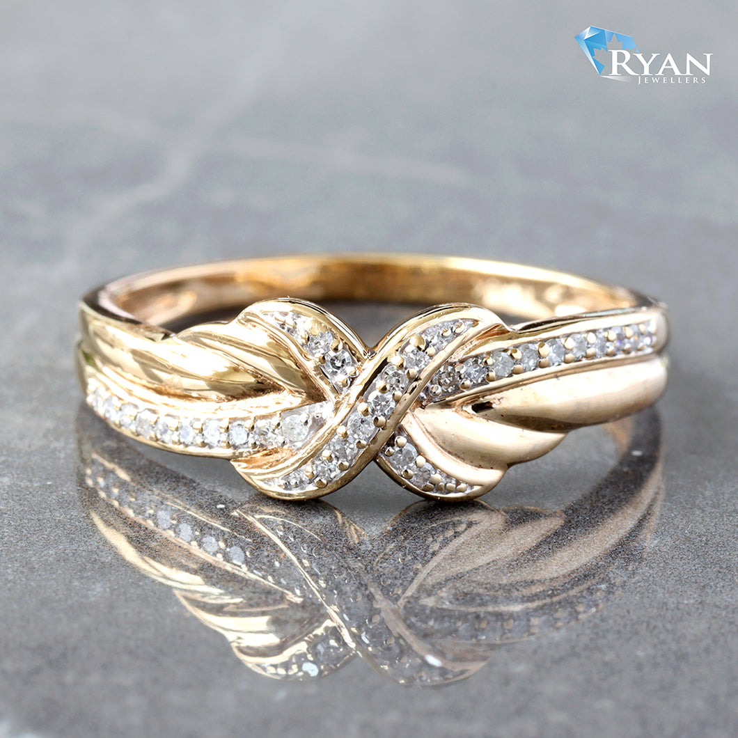 RING GY 0.08CTW NATURAL DIAMOND X CENTER WITH PAVE CROSS OVER HP SHOULDERS