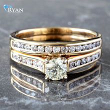 Load image into Gallery viewer, RING GY 14K 0.85CTW ROUND SOLITAIRE WITH CHANNEL SET SHOULDERS AND SOLDERED BAND
