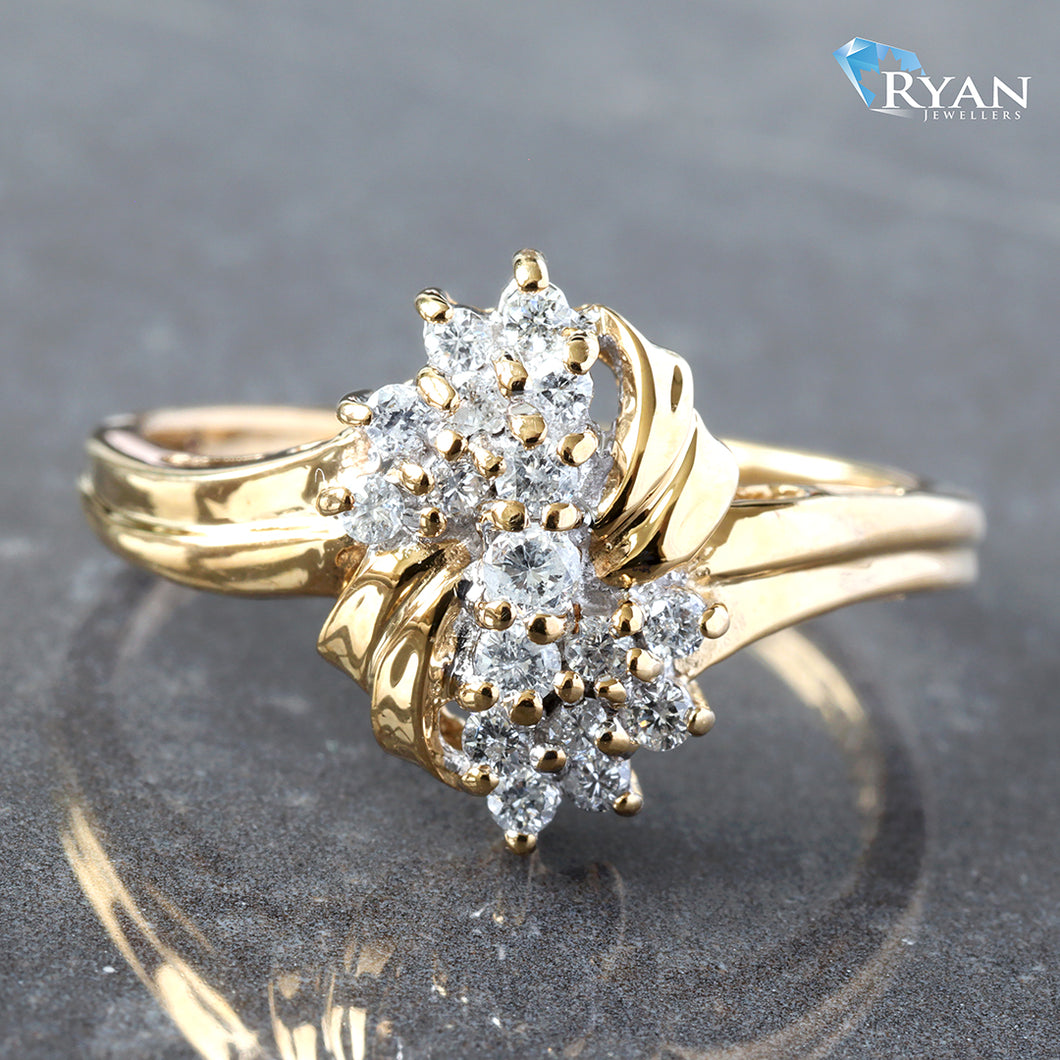 RING GY 10K 0.17CTW OVAL SHAPE PRONG SET DIAMOND CLUSTER WITH HP WEAVES AND SOFT WAVED TWO ROW SHOULDERS