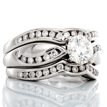 Load image into Gallery viewer, RING GW 14K 1.40CTW ROUND SOLITAIRE WITH HP AND CHANNEL SET CONTOURING WAVED SHOULDERS AND MATCHING &quot;BANDS&quot;
