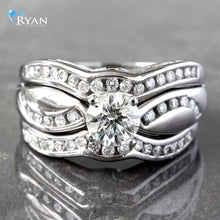 Load image into Gallery viewer, RING GW 14K 1.40CTW ROUND SOLITAIRE WITH HP AND CHANNEL SET CONTOURING WAVED SHOULDERS AND MATCHING &quot;BANDS&quot;
