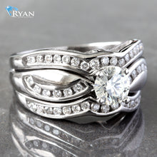 Load image into Gallery viewer, RING GW 14K 1.40CTW ROUND SOLITAIRE WITH HP AND CHANNEL SET CONTOURING WAVED SHOULDERS AND MATCHING &quot;BANDS&quot;
