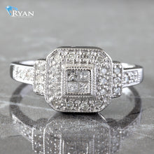 Load image into Gallery viewer, 0.25CTW Four Princess Cluster Center with Cushion Halo Ring
