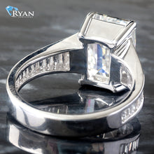 Load image into Gallery viewer, LAB RING GW 14K 7.43CTW EMERALD SOLITAIRE WITH TAPERED BAGUETTE BEZEL SHOULDERS
