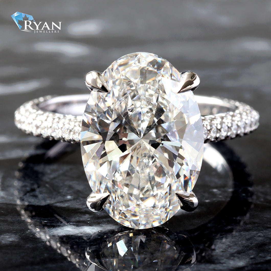 7.23ctw Oval Solitaire with Dome Pave Shoulders and Hidden Halo Ring