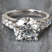 Load image into Gallery viewer, 6.47ctw Round Brilliant Lab Solitaire set into Big Graduated Diamond Shoulders
