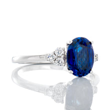Load image into Gallery viewer, 0.15ctw Three Diamond Cluster with Solitaire Oval Cut Blue Sapphire Ring
