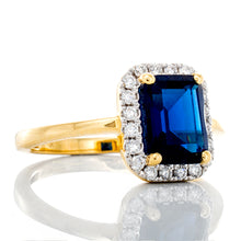 Load image into Gallery viewer, Emerald Cut Blue Sapphire with 0.25ctw Diamond Halo Ring
