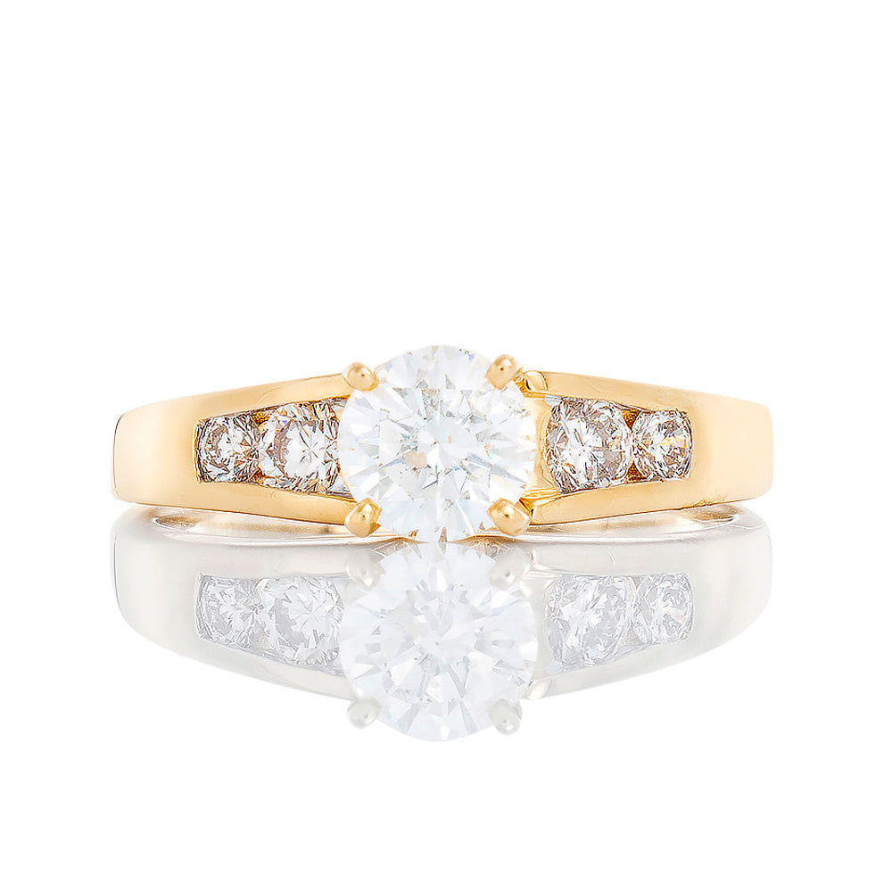 1.10ctw Diamod Solitaire with Channel Set Four Stone Graduated Shoulders