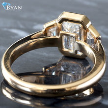 Load image into Gallery viewer, 3.13ctw Bezel Set Three Stone Emerald Center and Trapezoid Sides on High Polished Shoulders Ring
