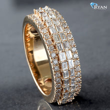 Load image into Gallery viewer, 1.50ctw Raised Vertical Set Baguette Center Round Diamond Sides 10k Gold
