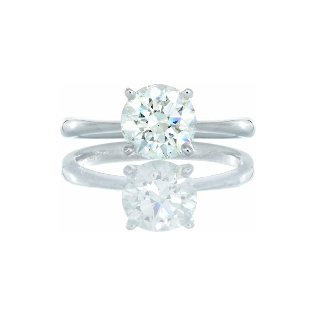 0.67ctw Round Solitaire Tapered High Polished Shoulders 14k White Gold