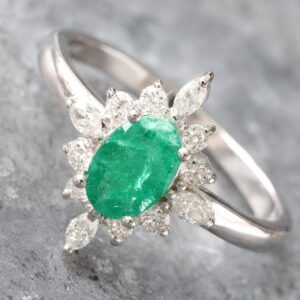 1.10ctw Oval Emerald with Round and Marquise Earth Mined Diamond Ring