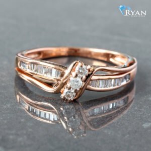 0.15CTW Natural 3 Stone Center With Channel Baguette Cross Over