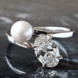 1.51ct Oval Solitaire with Pearl Cross Over
