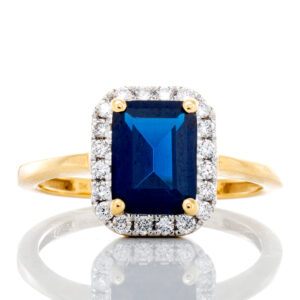Emerald Cut Blue Sapphire with 0.25ctw Diamond Halo Ring