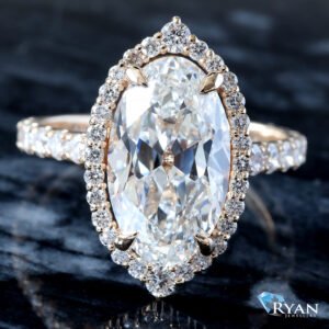 4.93ctw Old European Moval Cut Solitaire with Halo and Pave Diamond Shoulders
