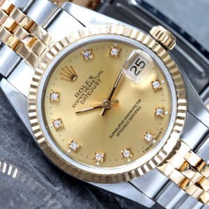 Rolex Datejust 31 Factory Champagne Diamond Dial 18K Gold Fluted Bezel and Jubilee Bracelet Watch