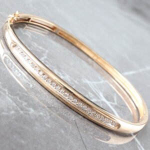 BANGLE GY 10KT 0.50CTW DIAMOND PRONG SET HINGE AND SAFETY GATE