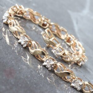 0.15CTW ALTERNATING ILLUSION SET DIAMOND AND INFINITY TENNIS BRACELET
