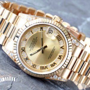 1995 ROLEX 31MM FACTORY GOLD ROMAN MYRIAD DIAMOND DIAL AND CASE 18K FLUTED BEZEL AND JUBILEE BRACELET