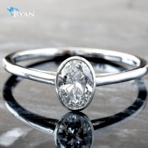 0.50ctw Oval Diamond Solitaire Set in A Bezel Setting High Polished Shoulders Ring 14K White Gold
