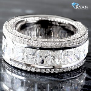 LAB RING GY 10K FOUR STONE 7.02CTW RADIANT CENTER ROUND DIAMOND PAVE TOP AND BOTTOM NORTH AND SOUTH CHANNEL AND PRONG SET BAND