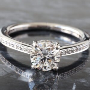 LAB RING GW 18K 1.18CTW ROUND BRILLIANT CENTER WITH HIDDEN HALO AND SHARED PRONG CHANNEL SHOULDERS