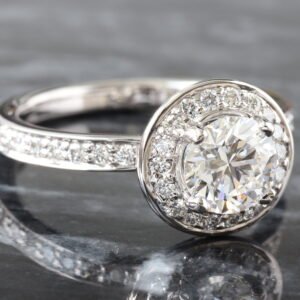 LAB RING GW 18K 1.25CTW ROUND BRILLIANT CENTER WITH ROUND HALO AND SHARED PRONG CHANNEL SHOULDERS