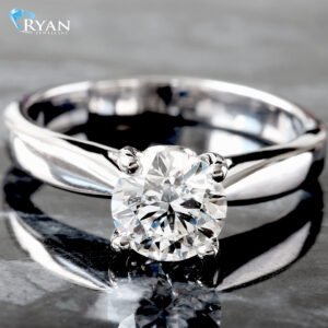 LAB RING GW 18K 1.06CTW ROUND BRILLIANT CENTER WITH HP TAPERED SOFT SQUARE EDGE CATHEDRAL SHOULDERS WITH BEZEL ACCENT AT BASKET BASE PROFILE